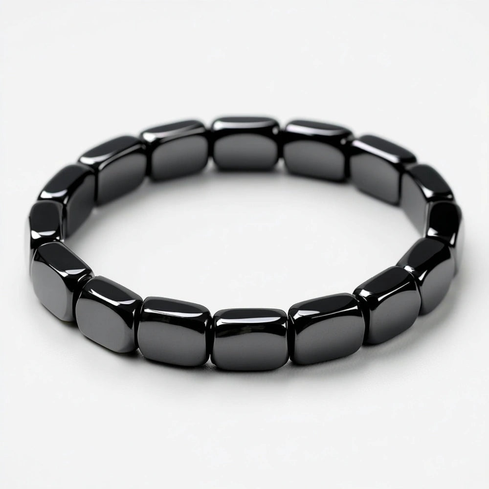 Dravyn hematite bracelet, tile-cut beads on stretch cord, isolated on white