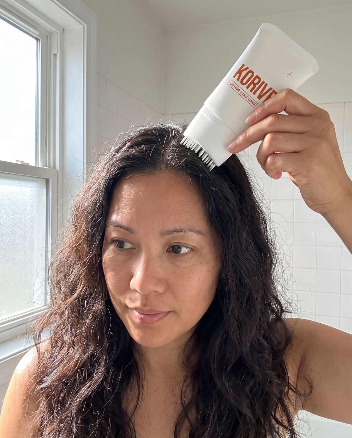 Korive serum used along a scalp part line