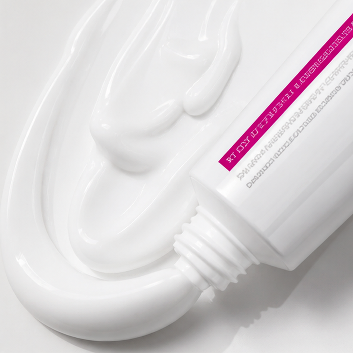 Aurela white cream texture with the tube nearby