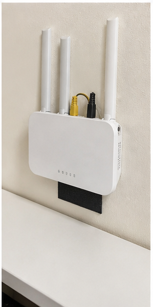 Griploop organizing a router cable