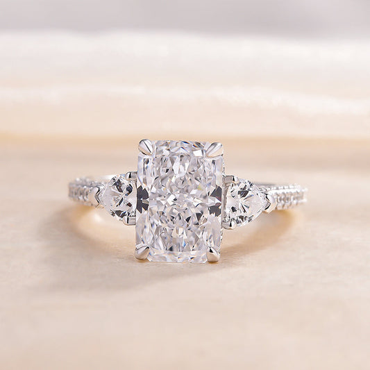Radiant Cut Three Stone Engagement Ring With Two Heart Cut Side Stones shine of diamond