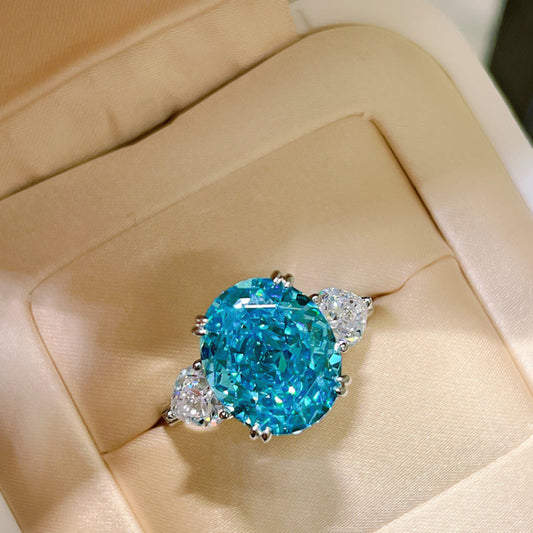 Greenish Blue Oval Cut Engagement Ring in Sterling Silver shine of diamond