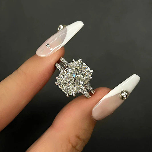 Sparkling Split Shank Cushion Cut Engagement Ring In Sterling Silver shine of diamond