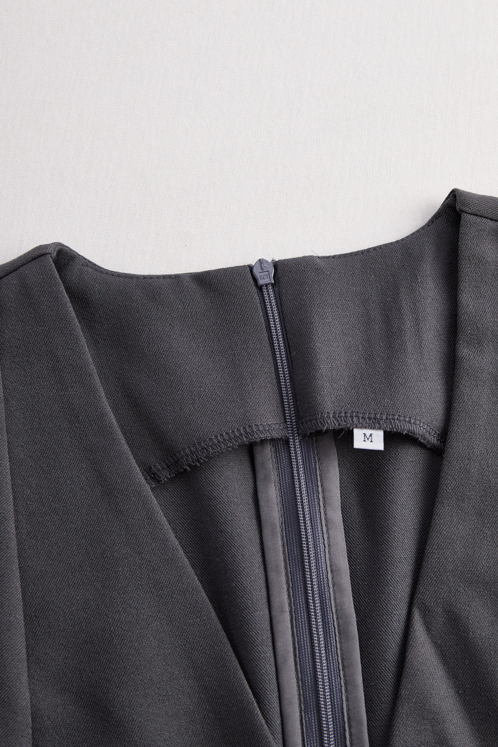 Sophisticated Sleeveless Peplum Jumpsuit In Charcoal Gray SN