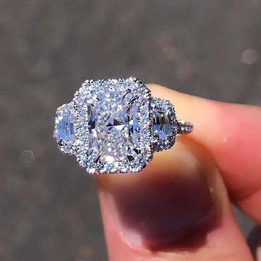 Exquisite Radiant Cut Halo Three Stone Engagement Ring In Sterling Silver shineofdiamond