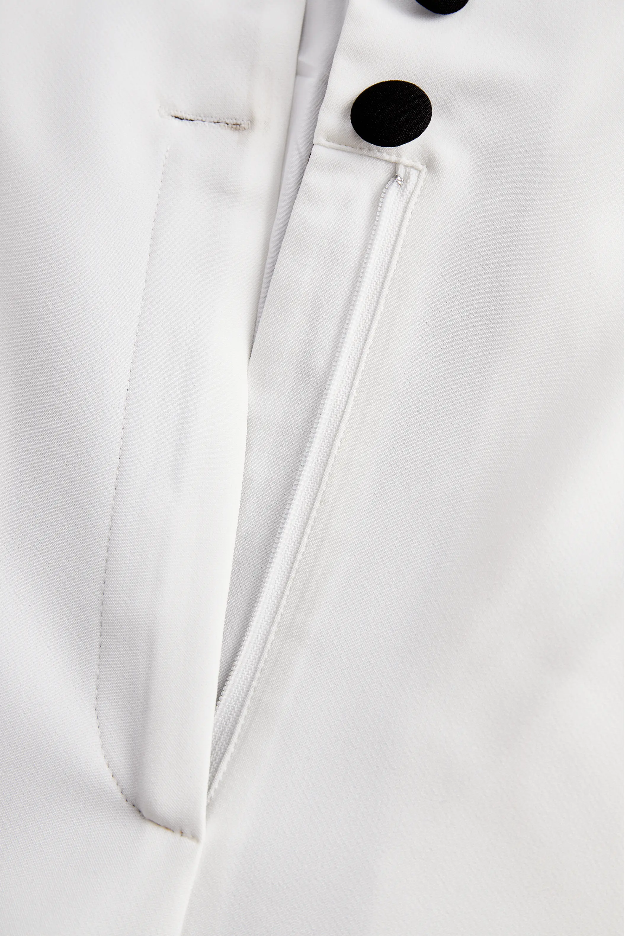 Sleek White Jumpsuit with Black Lapel & Dual Buttons - Jumpsuit CASA LARO