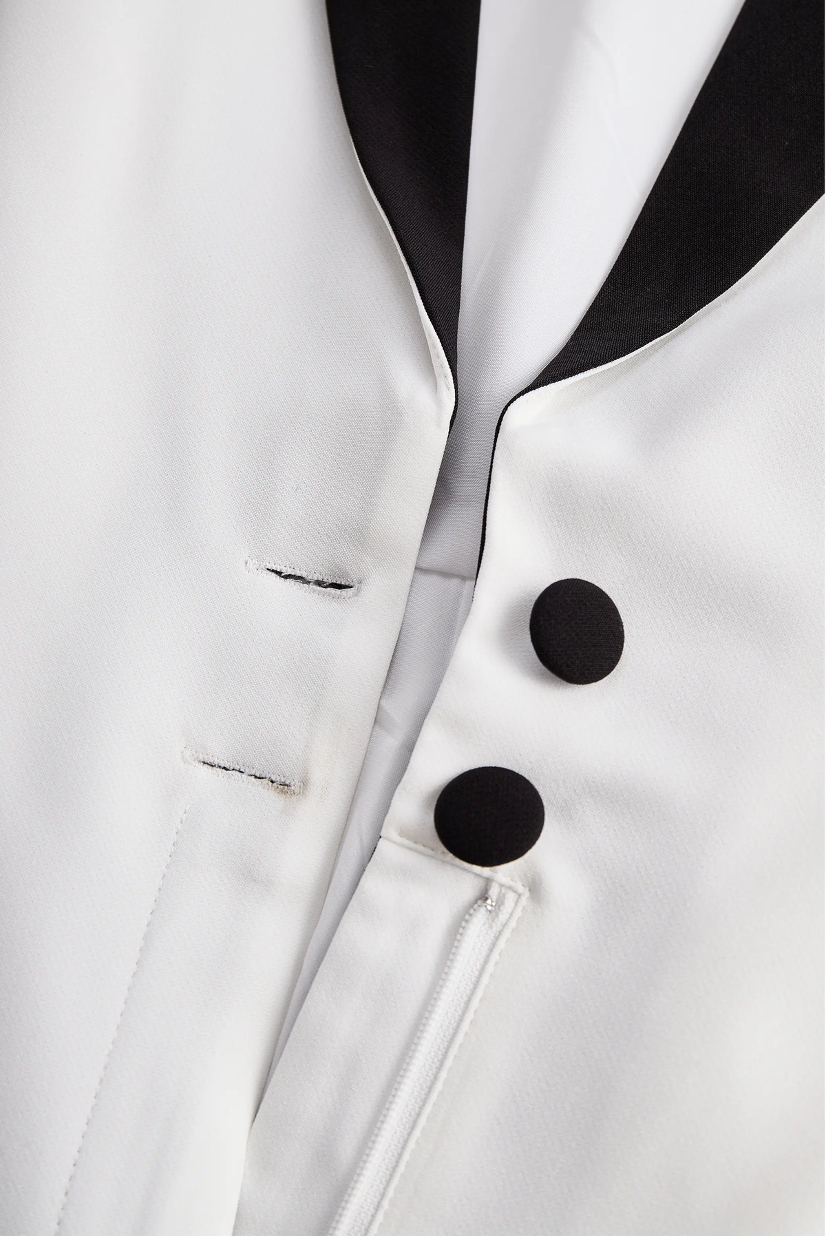 Sleek White Jumpsuit with Black Lapel & Dual Buttons - Jumpsuit CASA LARO