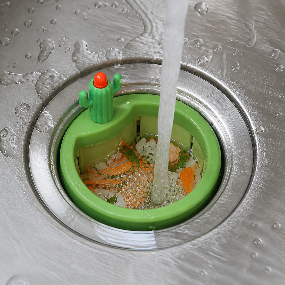 Cacticlean basket catching food scraps while water drains