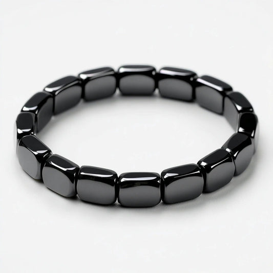 Dravyn hematite bracelet, tile-cut beads on stretch cord, isolated on white