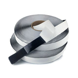 Griploop adhesive backing peeled from a roll