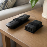 Griploop holding a remote and charging hub in place