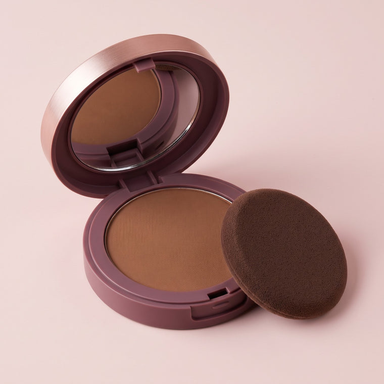 Vellora hairline powder compact open with its precision applicator ready to use