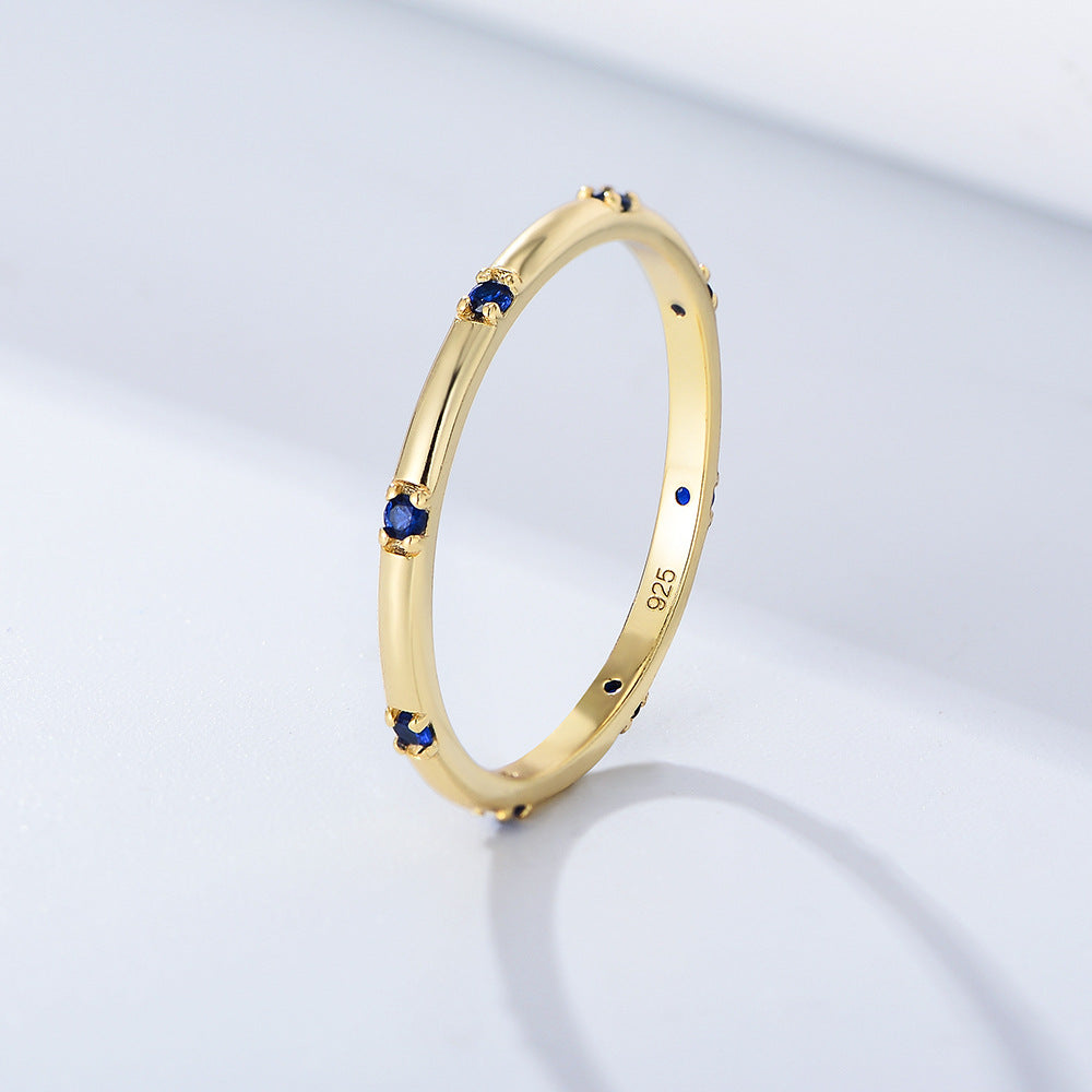 Stylish Golden Tone Wedding Band with Gemstone Accents Shineofidamond