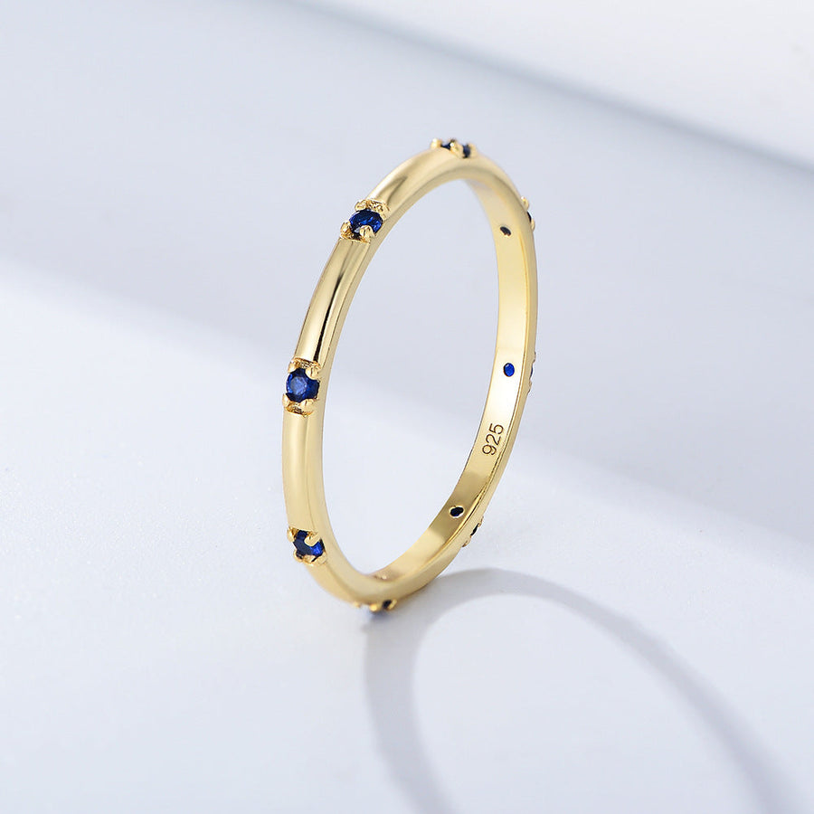 Stylish Golden Tone Wedding Band with Gemstone Accents Shineofidamond