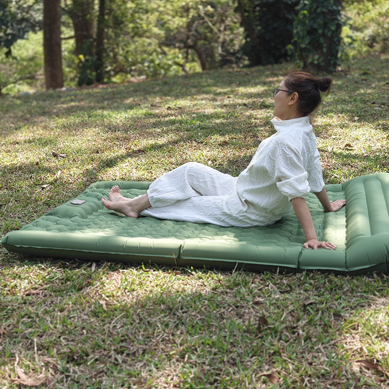 Valtro sleeping pad used outdoors on grass