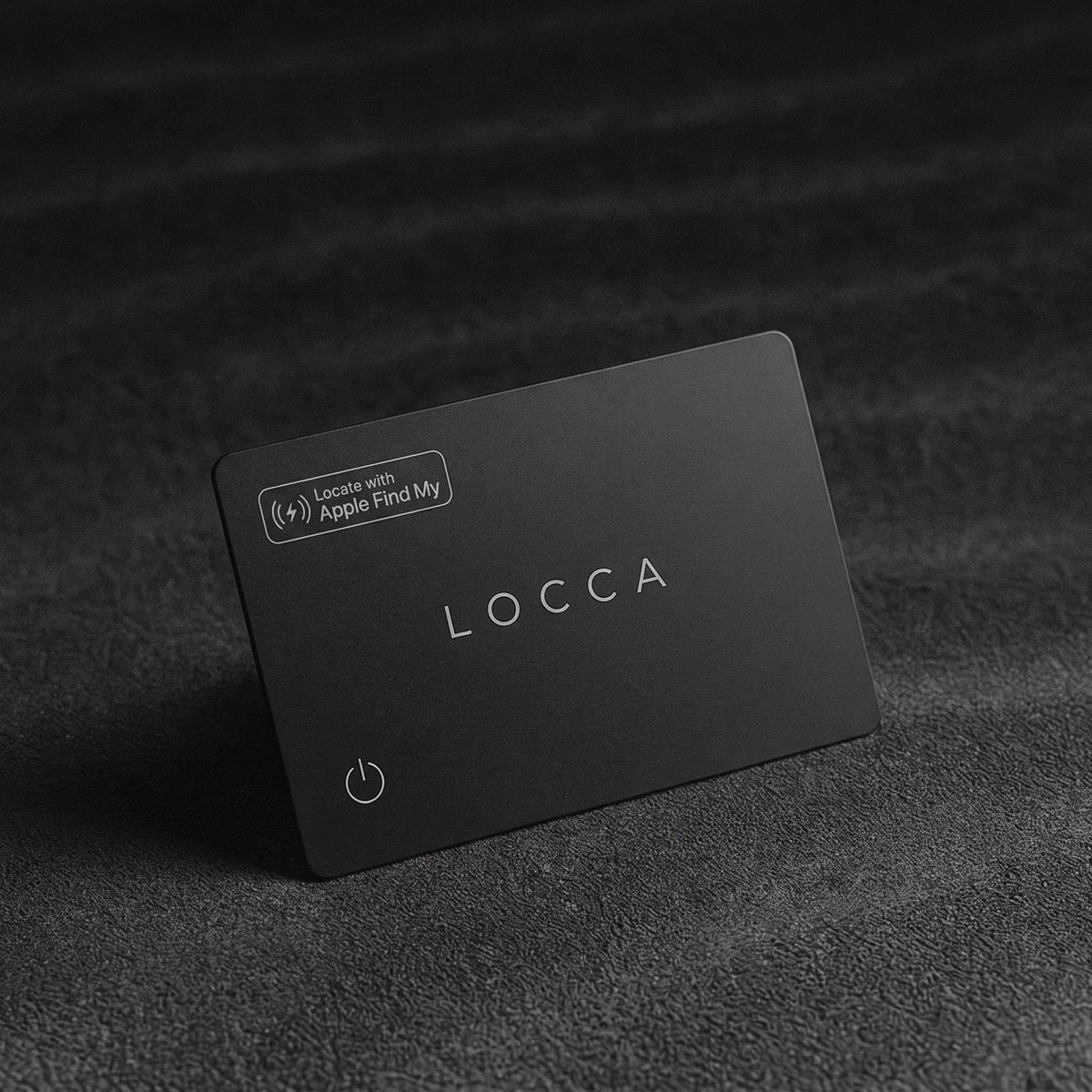 The Locca tracking card resting on a dark surface