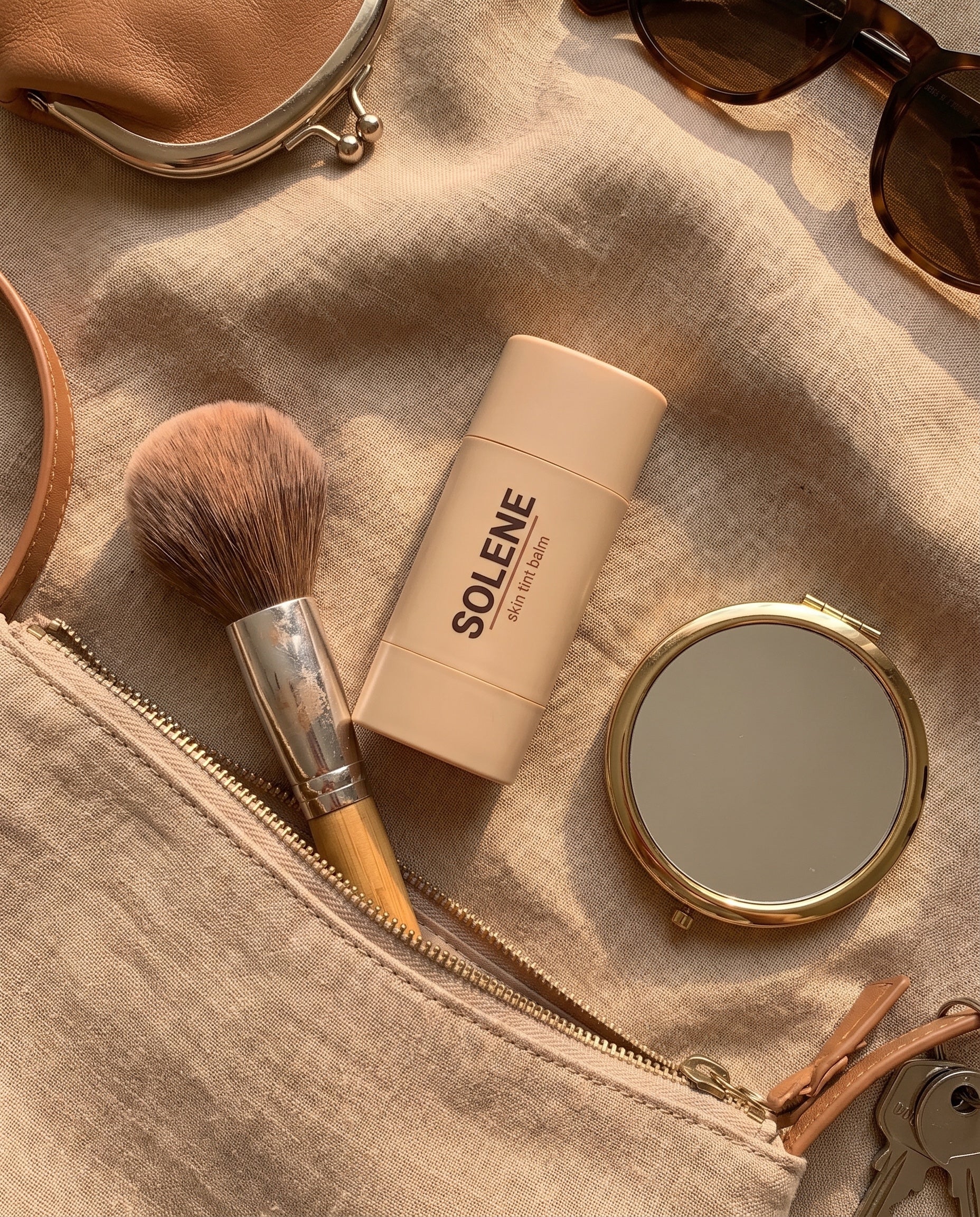 Solene skin tint balm in a vanity flatlay